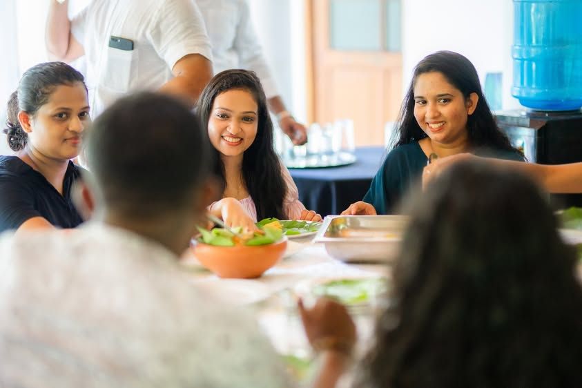 Konekt team sharing a meal during the 2024 Avurudu celebration