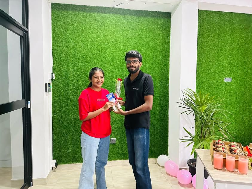 A Konekt team member receiving a Women’s Day appreciation gift